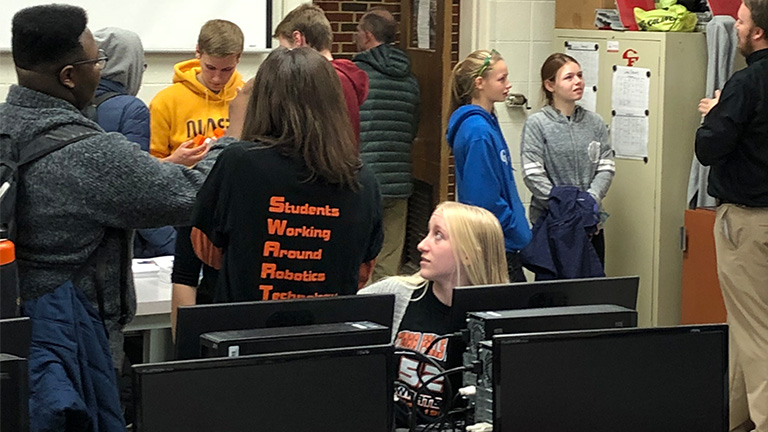 2020-8-SME-PRIME---Success-Story---Cedar-Falls---Students-and-computers.jpg