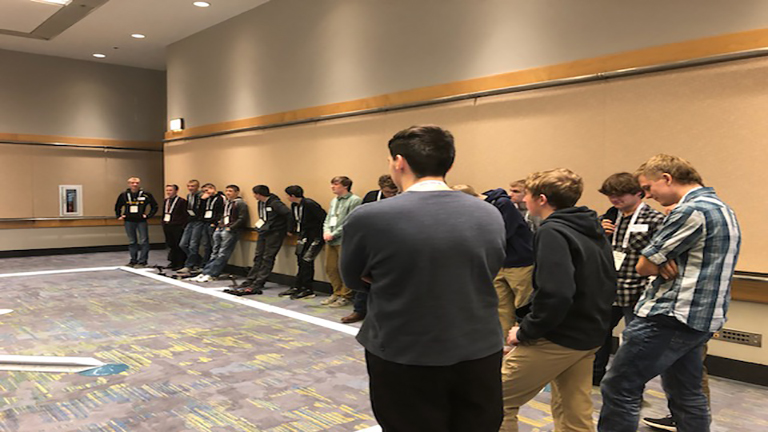 2019 FABTECH Student Summit - Kouts High School Students racing their race car.jpg