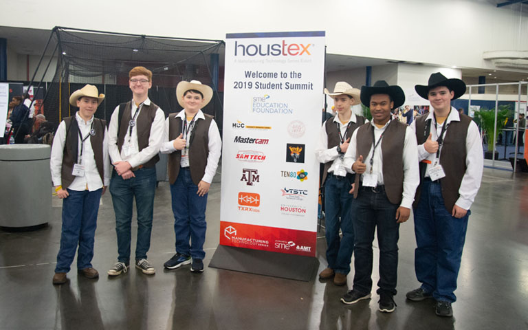 HOUSTEX - High School Students in front Student Summit banner